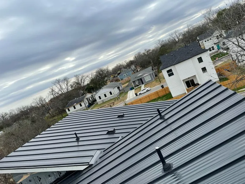 Standing seam metal roof panels with vents for Skylight Repair in Caldwell